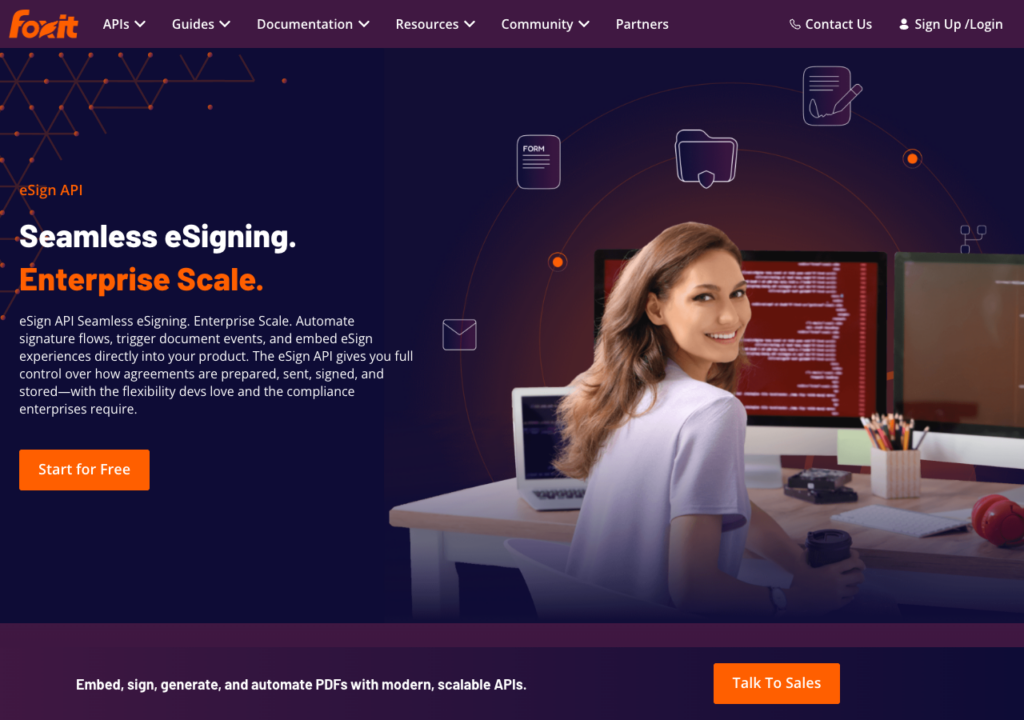 Foxit eSign API developer portal hero with a Start for Free button beside a developer working at her desk